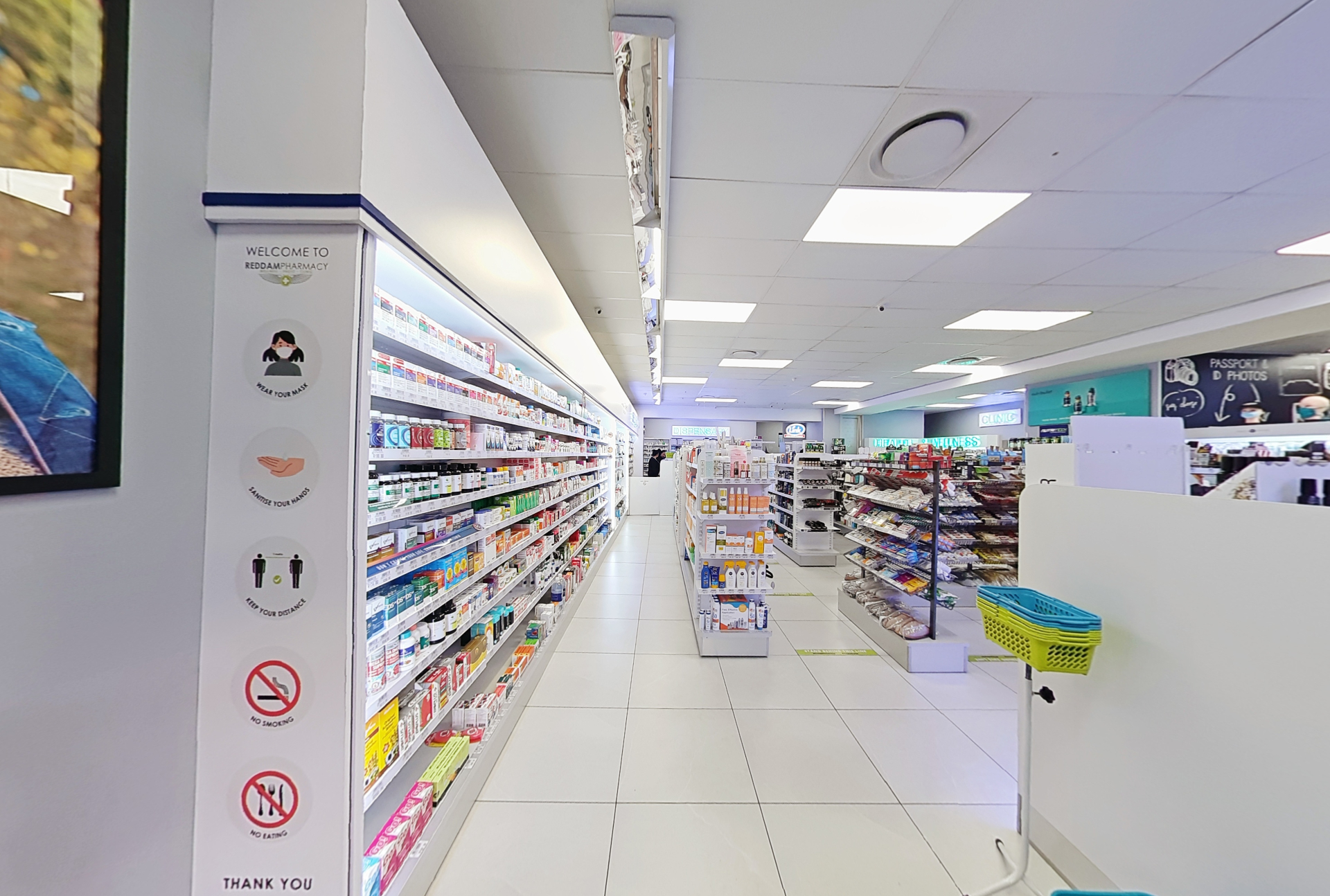 Inside Reddam Pharmacy — welcome aisle and supplement wall